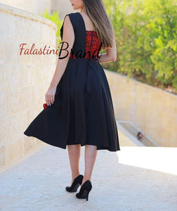 Elegant Black and Red Short Dress with Shoulder Details