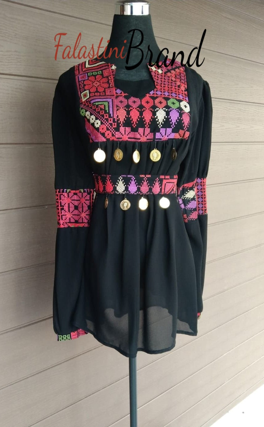 Black elegant blouse with red embroidery and stylish coins